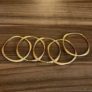 Uncommon James gold bracelets, barely worn, perfect condition